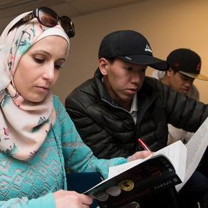 Fullerton College students are engrossed in reading.